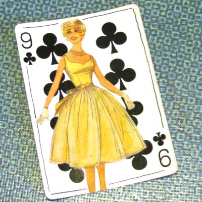 Altered playing card with sewing pattern image