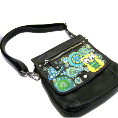 Painted owl leather Fossil purse.