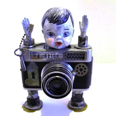 Camera assemblage doll featured in Somerset Studio Gallery